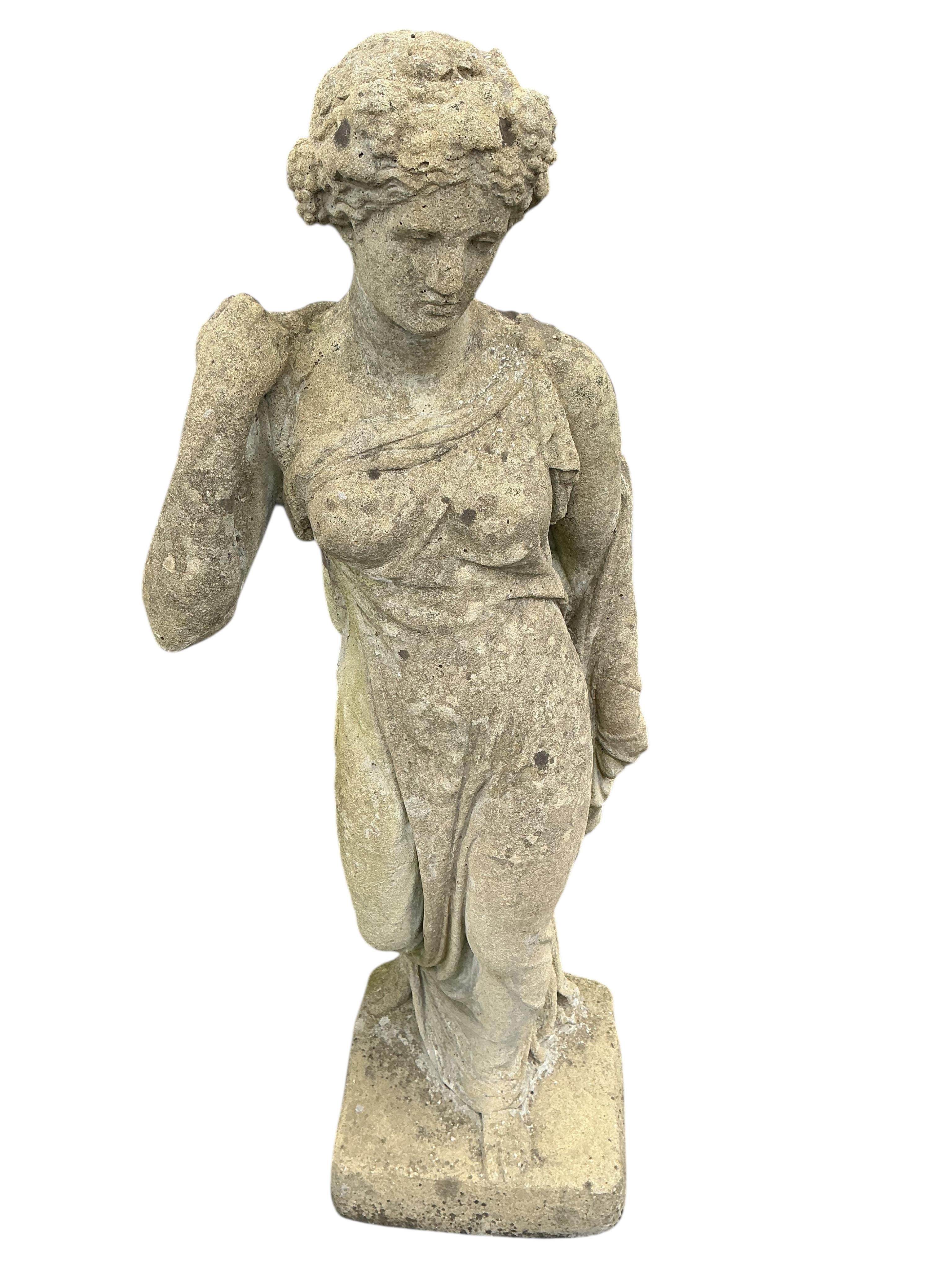A large reconstituted stone garden statue of a standing classical female on square plinth, height 194cm